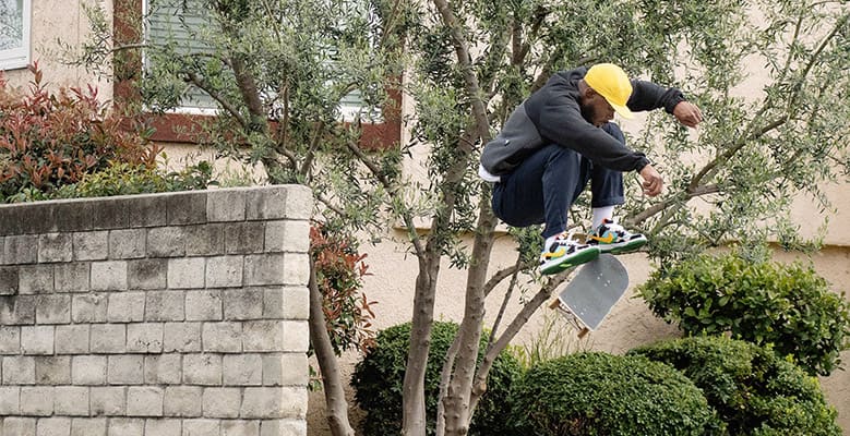 Person performing a skakeboard trick